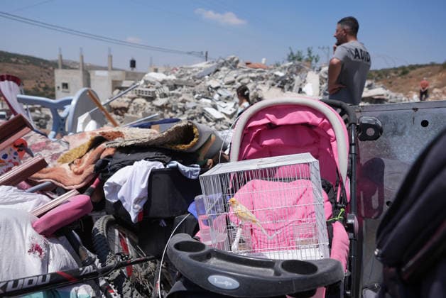 Israel demolishes Palestinian home in the West Bank SALFIT, WEST BANK, PALESTINE - JULY 13: A view of household belongings as Israeli forces demolish the home of Palestinian Hasan al-Rinawi with a bulldozer and heavy machinery alleging it was built without a permit in the village of Kufr al Dik, west of Salfit in the West Bank, Palestine, on July 13, 2026. Issam Rimawi Anadolu Salfit West Bank. Editorial use only. Please get in touch for any other usage.  Copyright: x2026xAnadoluxIssamxRimawix