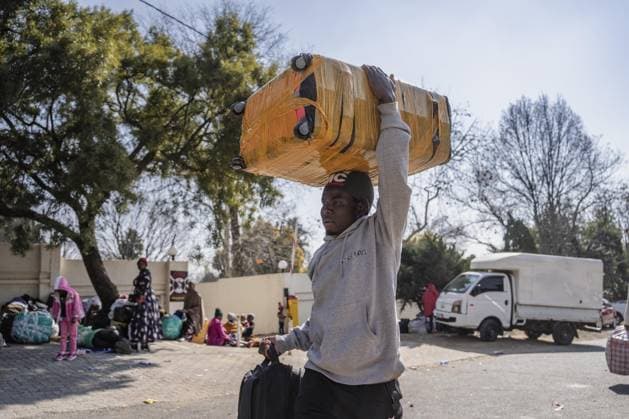 Malawians seek repatriation amid rising anti-immigrant tensions in South Africa JOHANNESBURG, SOUTH AFRICA - JULY 13: Malawian nationals wait outside the Malawian Consulate to seek repatriation amid growing fears following a surge in anti-immigrant protests and attacks in Johannesburg, South Africa, on July 13, 2026. Ihsaan Haffejee Anadolu Johannesburg Gauteng. Editorial use only. Please get in touch for any other usage.  Copyright: x2026xAnadoluxIhsaanxHaffejeex