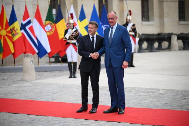 President Macron Welcomes European Leaders At The Coalition Of The Willing Summit - Paris French President Emmanuel Macron welcomes Chancellor of Germany, Friedrich Merz ahead the Coalition Of The Willing Summit in Paris, France on July 13, 2026. Photo by Eliot Blondet ABACAPRESS.COM Paris France  Copyright: xBlondetxEliot ABACAx
