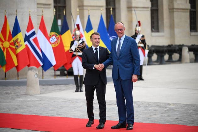 President Macron Welcomes European Leaders At The Coalition Of The Willing Summit - Paris French President Emmanuel Macron welcomes Chancellor of Germany, Friedrich Merz ahead the Coalition Of The Willing Summit in Paris, France on July 13, 2026. Photo by Eliot Blondet ABACAPRESS.COM Paris France  Copyright: xBlondetxEliot ABACAx