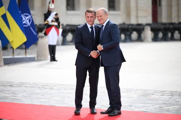 President Macron Welcomes European Leaders At The Coalition Of The Willing Summit - Paris French President Emmanuel Macron welcomes Polish Prime Minister, Donald Franciszek Tusk ahead the Coalition Of The Willing Summit in Paris, France on July 13, 2026. Photo by Eliot Blondet ABACAPRESS.COM Paris France  Copyright: xBlondetxEliot ABACAx