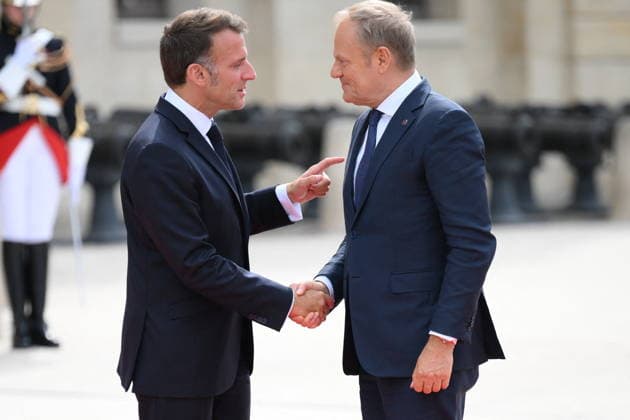 President Macron Welcomes European Leaders At The Coalition Of The Willing Summit - Paris French President Emmanuel Macron welcomes Polish Prime Minister, Donald Franciszek Tusk ahead the Coalition Of The Willing Summit in Paris, France on July 13, 2026. Photo by Eliot Blondet ABACAPRESS.COM Paris France  Copyright: xBlondetxEliot ABACAx