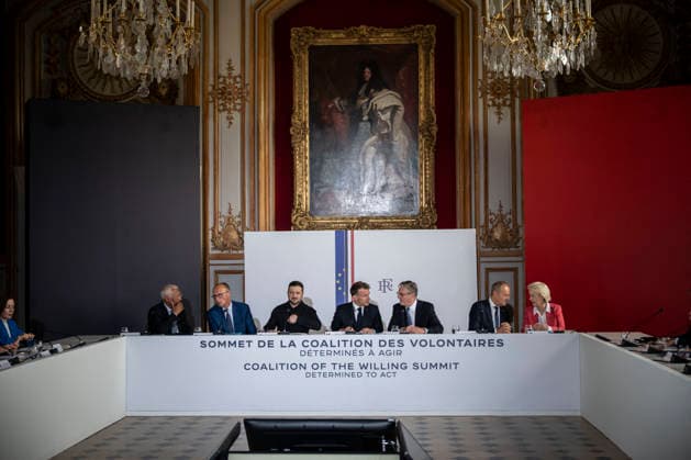 The Coalition Of The Willing Summit - Paris (L-R) European Council President Antonio Costa, German Chancellor Friedrich Merz, Ukrainian President Volodymyr Zelenskyy, French President Emmanuel Macron, British Prime Minister Sir Keir Starmer, Polish Prime Minister Donald Tusk and European Commission President Ursula von der Leyen are seen around a table at the Hotel des Invalides ahead of the Coalition of the Willing Summit in Paris, France, on July 13, 2026. Photo by Eliot Blondet ABACAPRESS.COM Paris France  Copyright: xBlondetxEliot ABACAx