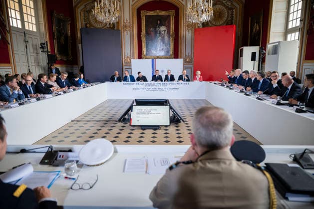 The Coalition Of The Willing Summit - Paris European and NATO leaders are seen around a table at the Hotel des Invalides ahead of the Coalition of the Willing Summit in Paris, France, on July 13, 2026. Seen in the photograph are: French President Emmanuel Macron, Ukrainian President Volodymyr Zelenskyy, Moldovan President Maia Sandu, Finnish President Alexander Stubb, Romanian President Nicusor Dan, Albanian Prime Minister Edi Rama, Croatian Prime Minister Andrej Plenkovic, Spanish Prime Minister Pedro Sanchez, Danish Prime Minister Mette Frederiksen, Norwegian Prime Minister Jonas Gahr Store, Swedish Prime Minister Ulf Kristersson, Greek Prime Minister Kyriakos Mitsotakis, Luxembourg Prime Minister Luc Frieden, Polish Prime Minister Donald  Copyright: xBlondetxEliot ABACAx