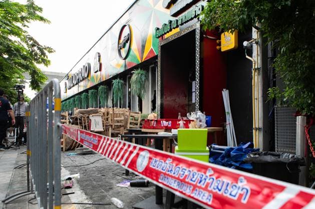 Deadly Bangkok Restaurant Fire Kills 27 and Injures 63 BANGKOK, THAILAND JULY 13, 2026: The aftermath of a fire is seen at a restaurant and bar on Ladprao Road in Bangkok s Chatuchak district, Thailand, on July 13, 2026, after a blaze swept through the premises the previous night. According to authorities, the fire broke out on the evening of July 12 and resulted in 27 fatalities and 63 injuries. Emergency services and investigators were deployed to the scene to assist victims, secure the area, and determine the cause of the fire. The incident ranks among the deadliest urban fires in Thailand in recent years and has prompted renewed attention to fire safety measures in public entertainment venues. BANGKOK TH Copyright: x xTEERAxNOISAKRANx xJNAxPressx