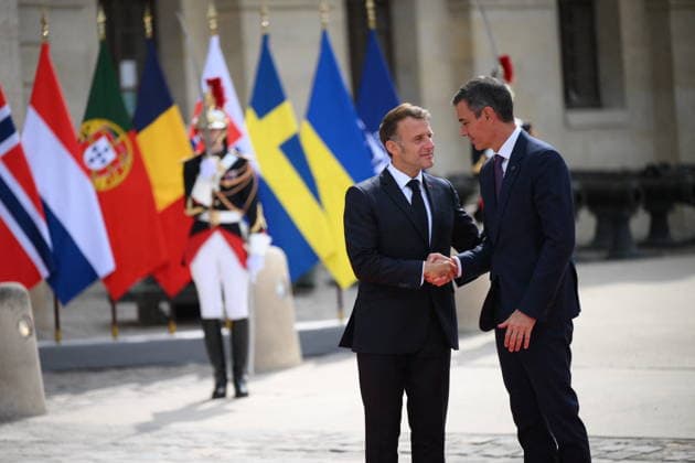 Emmanuel Macron, President of the French Republic, welcomes European leaders to the Coalition of the Willing Summit at the Hôtel des Invalides on July 13, 2026. Eliot Blondet Pool Abaca French President Emmanuel Macron welcomes Spanish Prime Minister Pedro Sánchez ahead of the Coalition of the Willing Summit in Paris, France on July 13, 2026. Photo by Eliot Blondet, ABACAPRESS.COM, Paris, France  Copyright: xEliotxBlondetx xPoolx xBestimagexEliotxBlondetx xPoolx xBestimagex
