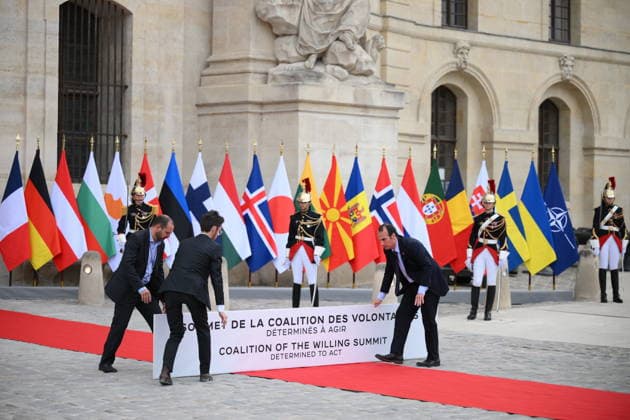 Emmanuel Macron, President of the French Republic, welcomes European leaders to the Coalition of the Willing Summit at the Hôtel des Invalides on July 13, 2026. Eliot Blondet, Pool Abaca Staff, sets up the sign for the welcoming ceremony ahead of the Coalition of the Willing Summit in Paris, France on July 13, 2026. Photo by Eliot Blondet, ABACAPRESS.COM, Paris, France  Copyright: xEliotxBlondetx xPoolx xBestimagexEliotxBlondetx xPoolx xBestimagex