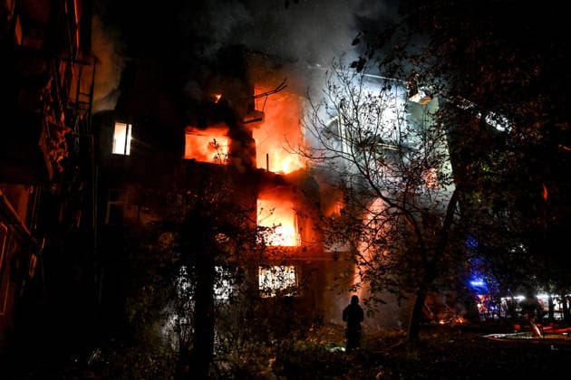 RECORD DATE NOT STATED Firefighters with the State Emergency Service of Ukraine extinguish a fire from an aerial ladder at a house following a nighttime Russian drone attack in Zaporizhzhia, Ukraine, on July 12, 2026. Six people, including a 15-year-old boy, were injured in the attack (Photo by Dmytro Smolienko Ukrinform) Nighttime Russian drone strike hits Zaporizhzhia  Copyright: xDmytroxSmolienkox