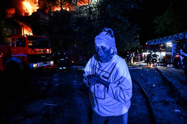 RECORD DATE NOT STATED A woman injured in a nighttime Russian drone strike stands at the site of the attack in Zaporizhzhia, Ukraine, on July 12, 2026. Six people, including a 15-year-old boy, were injured in the attack (Photo by Dmytro Smolienko Ukrinform) Nighttime Russian drone strike hits Zaporizhzhia  Copyright: xDmytroxSmolienkox
