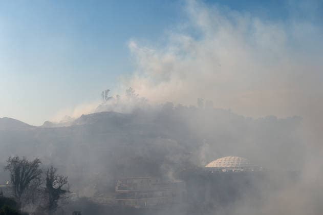Wildfire erupts near Campi Flegrei volcanic area in Italy POZZUOLI, ITALY - JULY 13: A big wildfire is seen in the Pisciarelli area located on the outer edge of the Solfatara volcanic crater in the Campi Flegrei (Phlegraean Fields) volcanic region in Pozzuoli on July 13, 2026. The fire broke out in the undergrowth and quickly spread to several car dealerships, causing fuel tanks and tyres to explode. Eliano Imperato Anadolu Pozzuoli Italy. Editorial use only. Please get in touch for any other usage.  Copyright: x2026xAnadoluxElianoxImperatox