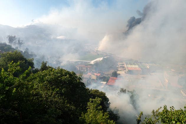 Wildfire erupts near Campi Flegrei volcanic area in Italy POZZUOLI, ITALY - JULY 13: A big wildfire is seen in the Pisciarelli area located on the outer edge of the Solfatara volcanic crater in the Campi Flegrei (Phlegraean Fields) volcanic region in Pozzuoli on July 13, 2026. The fire broke out in the undergrowth and quickly spread to several car dealerships, causing fuel tanks and tyres to explode. Eliano Imperato Anadolu Pozzuoli Italy. Editorial use only. Please get in touch for any other usage.  Copyright: x2026xAnadoluxElianoxImperatox