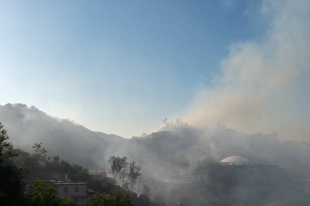 Wildfire erupts near Campi Flegrei volcanic area in Italy POZZUOLI, ITALY - JULY 13: A big wildfire is seen in the Pisciarelli area located on the outer edge of the Solfatara volcanic crater in the Campi Flegrei (Phlegraean Fields) volcanic region in Pozzuoli on July 13, 2026. The fire broke out in the undergrowth and quickly spread to several car dealerships, causing fuel tanks and tyres to explode. Eliano Imperato Anadolu Pozzuoli Italy. Editorial use only. Please get in touch for any other usage.  Copyright: x2026xAnadoluxElianoxImperatox