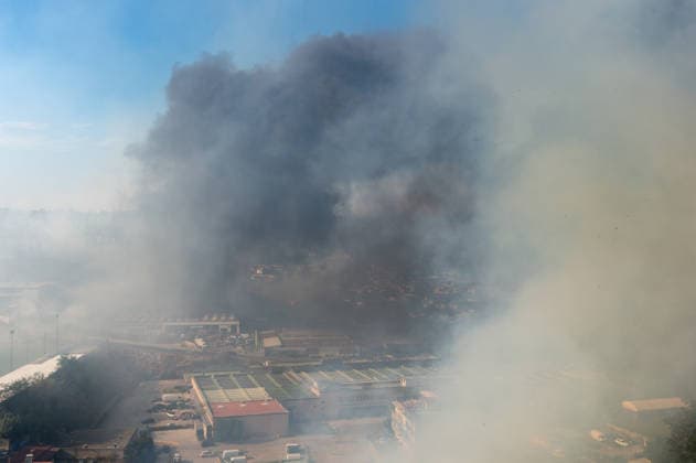 Wildfire erupts near Campi Flegrei volcanic area in Italy POZZUOLI, ITALY - JULY 13: A big wildfire is seen in the Pisciarelli area located on the outer edge of the Solfatara volcanic crater in the Campi Flegrei (Phlegraean Fields) volcanic region in Pozzuoli on July 13, 2026. The fire broke out in the undergrowth and quickly spread to several car dealerships, causing fuel tanks and tyres to explode. Eliano Imperato Anadolu Pozzuoli Italy. Editorial use only. Please get in touch for any other usage.  Copyright: x2026xAnadoluxElianoxImperatox