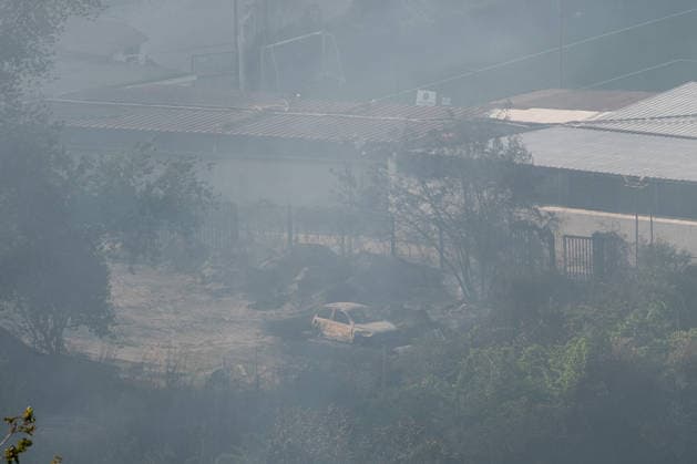Wildfire erupts near Campi Flegrei volcanic area in Italy POZZUOLI, ITALY - JULY 13: A burnt-out car is seen as a big wildfire is seen in the Pisciarelli area located on the outer edge of the Solfatara volcanic crater in the Campi Flegrei (Phlegraean Fields) volcanic region in Pozzuoli on July 13, 2026. The fire broke out in the undergrowth and quickly spread to several car dealerships, causing fuel tanks and tyres to explode. Eliano Imperato Anadolu Pozzuoli Italy. Editorial use only. Please get in touch for any other usage.  Copyright: x2026xAnadoluxElianoxImperatox