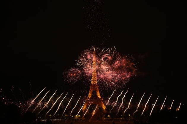 Eiffel Tower lights up during Bastille Day festivities PARIS, FRANCE - JULY 13: Fireworks illuminated the sky around the Eiffel Tower during a choreographed fireworks and drone show held in Paris, France, on July 13, 2026, ahead of the country s Bastille Day celebrations. The event took place on the eve of the annual Bastille Day military parade, drawing large crowds to the French capital. The display featured synchronized fireworks and drone formations around one of France s most iconic landmarks. Mustafa Yalcin Anadolu Paris France. Editorial use only. Please get in touch for any other usage.  Copyright: x2026xAnadoluxMustafaxYalcinx