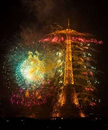 (260713) -- PARIS, July 13, 2026 -- Fireworks illuminate the sky near the Eiffel Tower during the Bastille Day celebrations in Paris, France, on July 13, 2026. ) FRANCE-PARIS-BASTILLE DAY-FIREWORKS-DRONE PERFORMANCE WuxHuiwo 