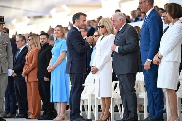 President Emmanuel Macron, Brigitte Macron, and officials at the July 14 military ceremony in Paris Jeanne Accorsini Pool Bestimage French President Emmanuel Macron, his wife Brigitte Macron, British Prime Minister Keir Starmer, Ukrainian First Lady Olena Zelenska, Ukrainian President Volodymyr Zelenskyy, French Prime Minister Sébastien Lecornu, German Chancellor Friedrich Merz, and President of the French Senate Gérard Larcher attend the annual Bastille Day military parade at the Place de la Concorde in Paris, France on July 14, 2026 ACCORSINIJEANNE accorsini0159 Credit Jeanne Accorsini SIPA 2607141142 Paris, France  Copyright: xJeannexAccorsinix xPoolx xBestimagexJeannexAccorsinix xPoolx xBestimagex