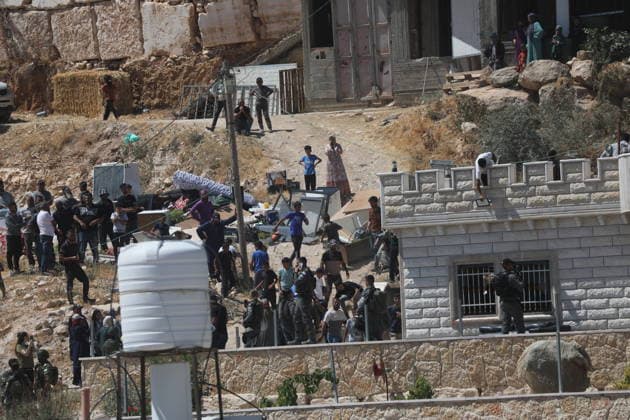 Israeli forces demolish Palestinian home in southern West Bank Israeli army vehicles demolish the home of Palestinian Osama Masaaf in the village of al-Deirat, east of Yatta, south of Hebron in the occupied West Bank, on July 14, 2026. Witnesses said the demolition took place during an Israeli military operation accompanied by heightened security measures. They added that Israeli forces used pepper spray to disperse Palestinians gathered at the scene, causing several people to sustain minor injuries. Photo by Mamoun Wazwaz apaimages Hebron West Bank Palestinian Territory 140726_Hebron_MW_00(7) Copyright: xapaimagesxMamounxWazwazx xapaimagesx