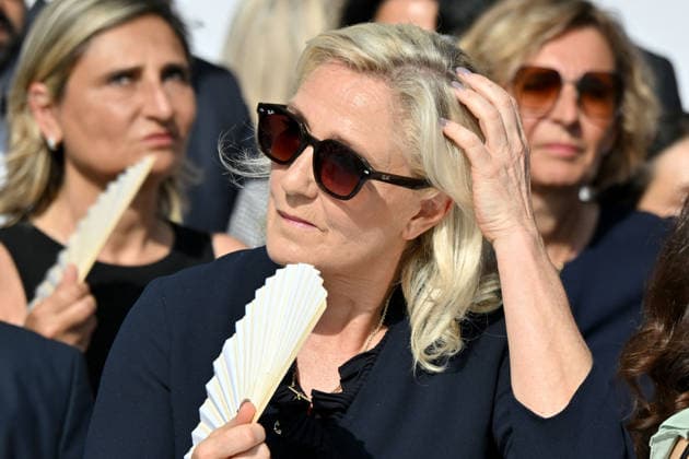 July 14, 2026, military parade in Nice attended by Marine Le Pen, who was invited by Eric Ciotti, the mayor of Nice, president of the UDR, and an ally of the RN, on the sidelines of the commemorations marking the tenth anniversary of the Nice attack. Marine Le Pen arrived accompanied by the UDR representative for the Alpes-Maritimes, Christelle D’Intorni, to applause from the official stands. During the parade, the declared candidate for the upcoming presidential election sat in the front row, flanked by Bernard Chaix and Christelle D’Intorni, the UDR members of the National Assembly from the Alpes-Maritimes, Alexandra Louis, the interministerial delegate for victim assistance (DIAV), the prefect of the Alpes-Maritimes, Laurent Houttiaux,  Copyright: xBrunoxBebertx xBestimagexBrunoxBebertx xBestimagex