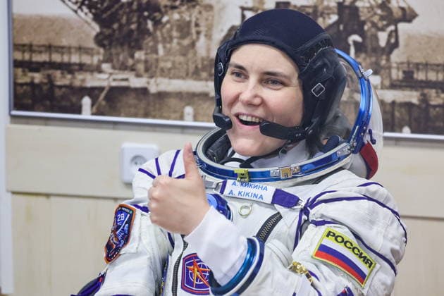 KAZAKHSTAN, BAIKONUR - JULY 14, 2026: ISS Expedition 74 75 prime crew member, Roscosmos cosmonaut Anna Kikina gives a thumbs up gesture during a spacesuit check before the launch of the Soyuz-2.1a rocket booster carrying the Soyuz MS-29 spacecraft from Baikonur Cosmodrome. Sergei Savostyanov TASS  95029776
