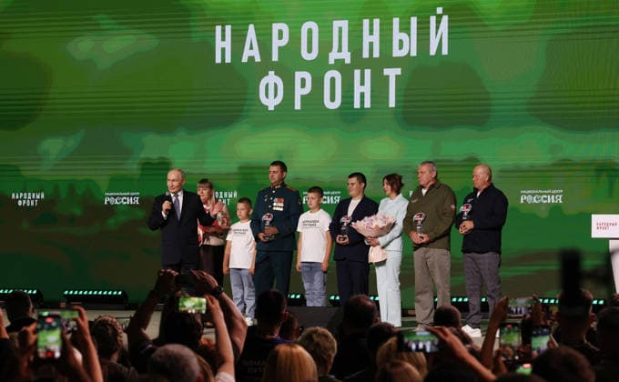 July 14, 2026, Moscow, Moscow Oblast, Russia: Russian President Vladimir Putin, left, congratulates recipients of the Defender of the Fatherland awards during the All-Russia People s Front Everything for Victory! forum at the Russia National Centre, July 13, 2026 in Moscow, Russia. Moscow Russia - ZUMAp138 20260714_zaa_p138_009 Copyright: xVyacheslavxProkofiev RussianxGovx
