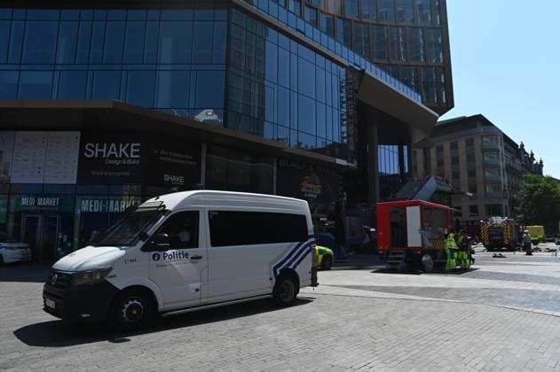 the scene of a fire at the OXY building at place De Brouckere, in Brussels, Tuesday 14 July 2026s. The Brussels Labour Inspectorate confirms several bodies were found in the lift shafts, 6 people are still missing. The fire broke out on the second floor of the building that is currently being renovated.  EMILExWINDAL 181120362