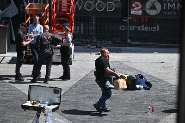 the scene of a fire at the OXY building at place De Brouckere, in Brussels, Tuesday 14 July 2026s. The Brussels Labour Inspectorate confirms several bodies were found in the lift shafts, 6 people are still missing. The fire broke out on the second floor of the building that is currently being renovated.  EMILExWINDAL 181122358