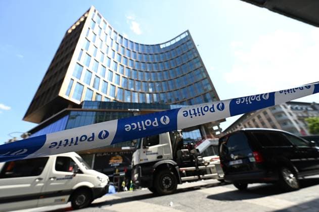 the scene of a fire at the OXY building at place De Brouckere, in Brussels, Tuesday 14 July 2026s. The Brussels Labour Inspectorate confirms several bodies were found in the lift shafts, 6 people are still missing. The fire broke out on the second floor of the building that is currently being renovated.  EMILExWINDAL 181123913