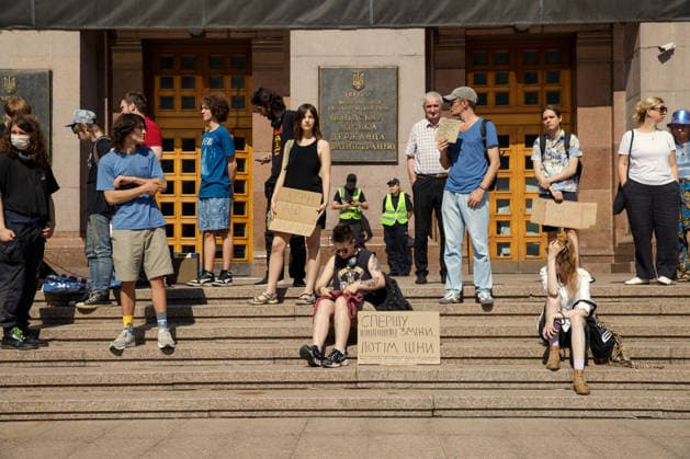 Demonstrators protest against the increase in municipal transport fares during the Preserve Affordable Transport in Kyiv rally outside the Kyiv City State Administration building, Kyiv, Ukraine, July 14, 2026. The capital plans to raise the fare for municipal transport to UAH 30 per single trip. The new tariffs will take effect from July 15, 2026. (Photo by Marianna Kotyk Ukrinform) Kyivans protest against municipal transport fare hike  Copyright: xMariannaxKotykx