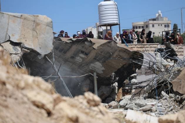 Israeli Forces Demolish Palestinian Home South of Hebron AL-DEIRAT, WEST BANK JULY 14, 2026: Israeli forces demolished the home of Palestinian resident Osama Masaaf in the village of Al-Deirat, south of Hebron, in the occupied West Bank, on July 14, 2026, displacing a family of eight. Israeli authorities said the house was demolished for being built without an Israeli-issued permit. Hebron Palestine, State of Copyright: x xMosabxshawerx xJNAxPressx