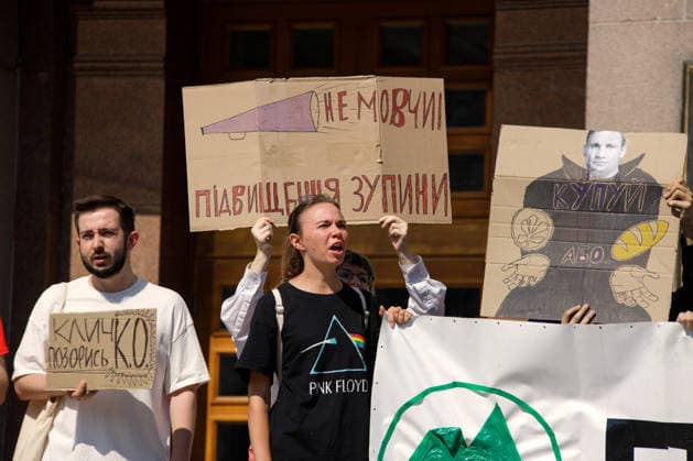 Demonstrators protest against the increase in municipal transport fares during the Preserve Affordable Transport in Kyiv rally outside the Kyiv City State Administration building, Kyiv, Ukraine, July 14, 2026. The capital plans to raise the fare for municipal transport to UAH 30 per single trip. The new tariffs will take effect from July 15, 2026. (Photo by Marianna Kotyk Ukrinform) Kyivans protest against municipal transport fare hike  Copyright: xMariannaxKotykx