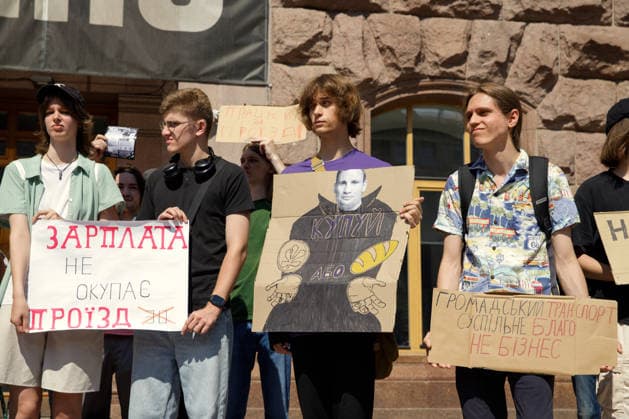Demonstrators protest against the increase in municipal transport fares during the Preserve Affordable Transport in Kyiv rally outside the Kyiv City State Administration building, Kyiv, Ukraine, July 14, 2026. The capital plans to raise the fare for municipal transport to UAH 30 per single trip. The new tariffs will take effect from July 15, 2026. (Photo by Marianna Kotyk Ukrinform) Kyivans protest against municipal transport fare hike  Copyright: xMariannaxKotykx
