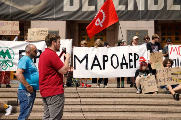 An activist speaks during the Preserve Affordable Transport in Kyiv rally against the increase in municipal transport fares outside the Kyiv City State Administration building, Kyiv, Ukraine, July 14, 2026. The capital plans to raise the fare for municipal transport to UAH 30 per single trip. The new tariffs will take effect from July 15, 2026. (Photo by Marianna Kotyk Ukrinform) Kyivans protest against municipal transport fare hike  Copyright: xMariannaxKotykx