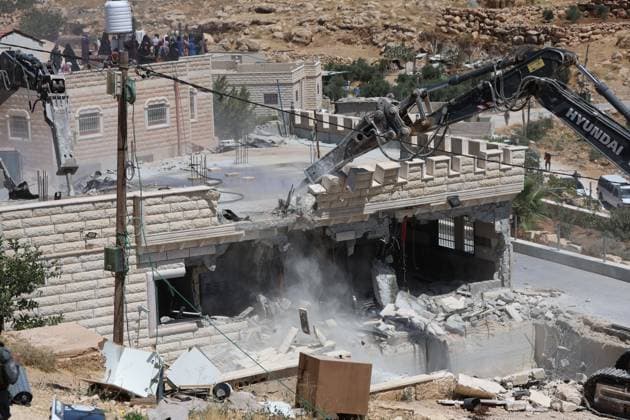 Israeli Forces Demolish Palestinian Home South of Hebron AL-DEIRAT, WEST BANK JULY 14, 2026: Israeli forces demolished the home of Palestinian resident Osama Masaaf in the village of Al-Deirat, south of Hebron, in the occupied West Bank, on July 14, 2026, displacing a family of eight. Israeli authorities said the house was demolished for being built without an Israeli-issued permit. Hebron Palestine, State of Copyright: x xMosabxshawerx xJNAxPressx