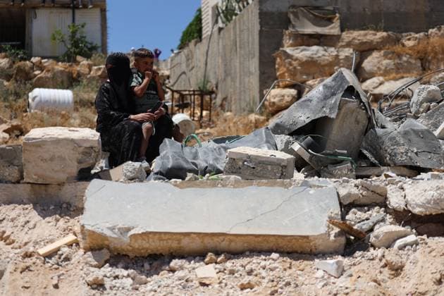 Israeli Forces Demolish Palestinian Home South of Hebron AL-DEIRAT, WEST BANK JULY 14, 2026: Israeli forces demolished the home of Palestinian resident Osama Masaaf in the village of Al-Deirat, south of Hebron, in the occupied West Bank, on July 14, 2026, displacing a family of eight. Israeli authorities said the house was demolished for being built without an Israeli-issued permit. Hebron Palestine, State of Copyright: x xMosabxshawerx xJNAxPressx