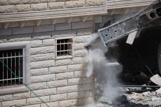 Israeli Forces Demolish Palestinian Home South of Hebron AL-DEIRAT, WEST BANK JULY 14, 2026: Israeli forces demolished the home of Palestinian resident Osama Masaaf in the village of Al-Deirat, south of Hebron, in the occupied West Bank, on July 14, 2026, displacing a family of eight. Israeli authorities said the house was demolished for being built without an Israeli-issued permit. Hebron Palestine, State of Copyright: x xMosabxshawerx xJNAxPressx