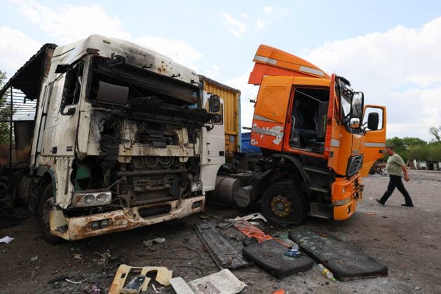 RUSSIA, LUGANSK - JULY 14, 2026: Destroyed vehicles are seen after a military strike on a parking lot with civilian trucks. Alexander Reka TASS  95028650