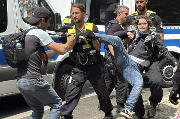 Police intervene during Rheinmetall protest in Berlin BERLIN, GERMANY - JULY 14: German police intervene against more than 30 activists supporting the Peacefully Against Genocide group during a protest near a Rheinmetall facility in Berlin s Wedding district, Germany, on July 14, 2026. Erbil Basay Anadolu Berlin Germany. Editorial use only. Please get in touch for any other usage.  Copyright: x2026xAnadoluxErbilxBasayx