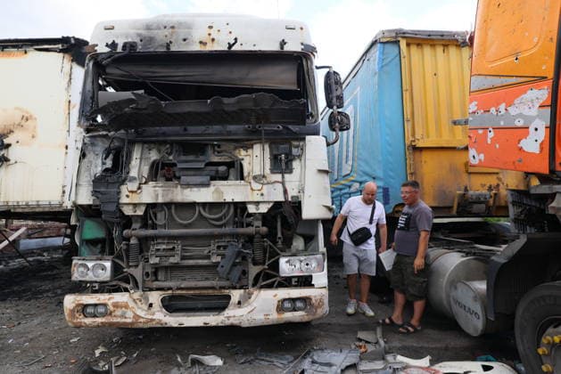 RUSSIA, LUGANSK - JULY 14, 2026: Destroyed vehicles are seen after a military strike on a parking lot with civilian trucks. Alexander Reka TASS  95028654