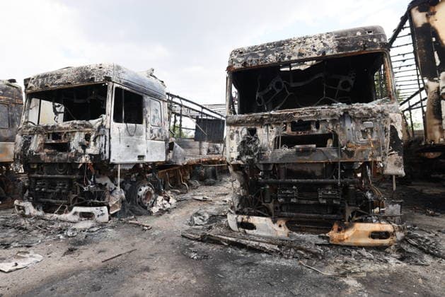RUSSIA, LUGANSK - JULY 14, 2026: Destroyed vehicles are seen after a military strike on a parking lot with civilian trucks. Alexander Reka TASS  95028669