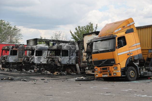 RUSSIA, LUGANSK - JULY 14, 2026: Destroyed vehicles are seen after a military strike on a parking lot with civilian trucks. Alexander Reka TASS  95028680