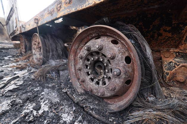 RUSSIA, LUGANSK - JULY 14, 2026: A destroyed vehicle is seen after a military strike on a parking lot with civilian trucks. Alexander Reka TASS  95028622