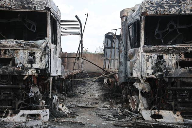 RUSSIA, LUGANSK - JULY 14, 2026: Destroyed vehicles are seen after a military strike on a parking lot with civilian trucks. Alexander Reka TASS  95028634