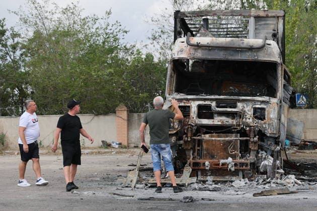 RUSSIA, LUGANSK - JULY 14, 2026: A destroyed vehicle is seen after a military strike on a parking lot with civilian trucks. Alexander Reka TASS  95028677