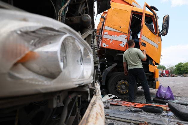 RUSSIA, LUGANSK - JULY 14, 2026: Destroyed vehicles are seen after a military strike on a parking lot with civilian trucks Lugansk Russia  - ZUMAt113 20260714_zaa_t113_241 Copyright: xAlexanderxRekax