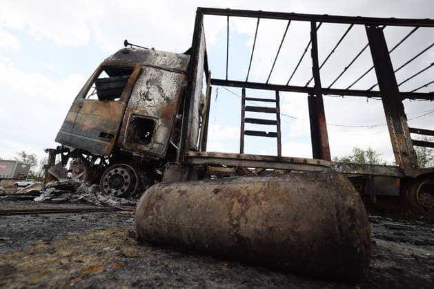 RUSSIA, LUGANSK - JULY 14, 2026: A destroyed vehicle is seen after a military strike on a parking lot with civilian trucks Lugansk Russia  - ZUMAt113 20260714_zaa_t113_242 Copyright: xAlexanderxRekax