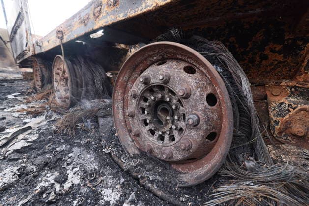 RUSSIA, LUGANSK - JULY 14, 2026: A destroyed vehicle is seen after a military strike on a parking lot with civilian trucks Lugansk Russia  - ZUMAt113 20260714_zaa_t113_243 Copyright: xAlexanderxRekax