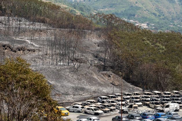 Fire breaks out on Solfatara volcano in Pozzuoli POZZUOLI, ITALY - JULY 14: The aftermath of a wildfire is seen in the Pisciarelli area on the outer edge of the Solfatara volcanic crater in the Campi Flegrei (Phlegraean Fields) volcanic region near Naples, Italy, on July 14, 2026. The fire, which broke out on July 13, burned vegetation across the area as firefighters continued assessment and recovery operations. Eliano Imperato Anadolu Naples Italy. Editorial use only. Please get in touch for any other usage.  Copyright: x2026xAnadoluxElianoxImperatox