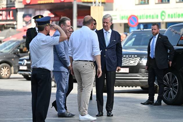 Prime Minister Bart de Wever, Bruxelles-Brussel mayor Philippe Close and King Philippe - Filip of Belgium pictured at the scene of a fire at the OXY building at place De Brouckere, in Brussels, Tuesday 14 July 2026s. The Brussels Labour Inspectorate confirms several bodies were found in the lift shafts, 6 people are still missing. The fire broke out on the second floor of the building that is currently being renovated.  EMILExWINDAL 181130341
