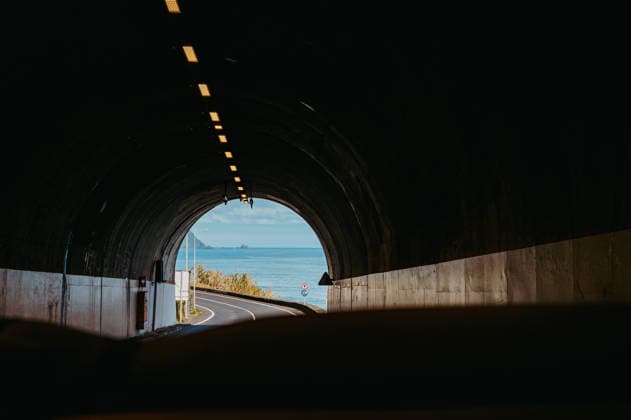 Ocean view through Água d Alto Tunnel on Madeira s scenic VE2 highway São Vicente, Madeira, Portugal R_EPZT260712EC-2075289-01 ,model released, Symbolfoto ,property released